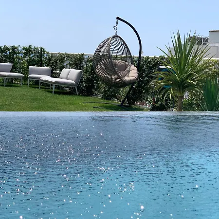 Sea Front Luxury With A Private Infinity Pool , A Large Garden And A Private Garage On The In Апартаменты