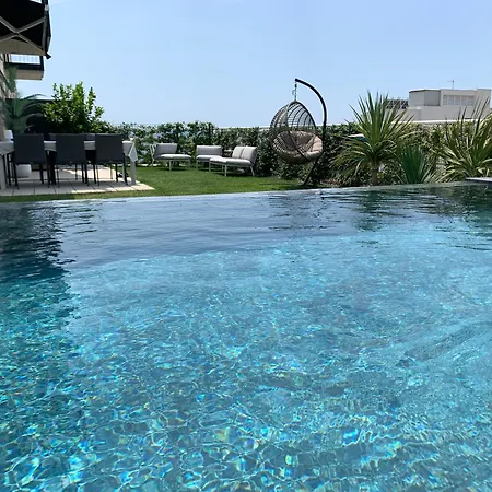 Sea Front Luxury With A Private Infinity Pool , A Large Garden And A Private Garage On The In *