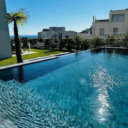 Sea Front Luxury With A Private Infinity Pool , A Large Garden And A Private Garage On The In